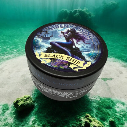 Jar of 'Siren's Song Black Ship' Shaving soap on a green underwater background