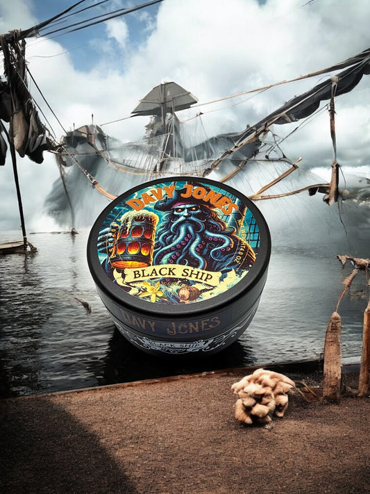 Pirate ship with a 'Davy Jones shaving soap' product container in the foreground